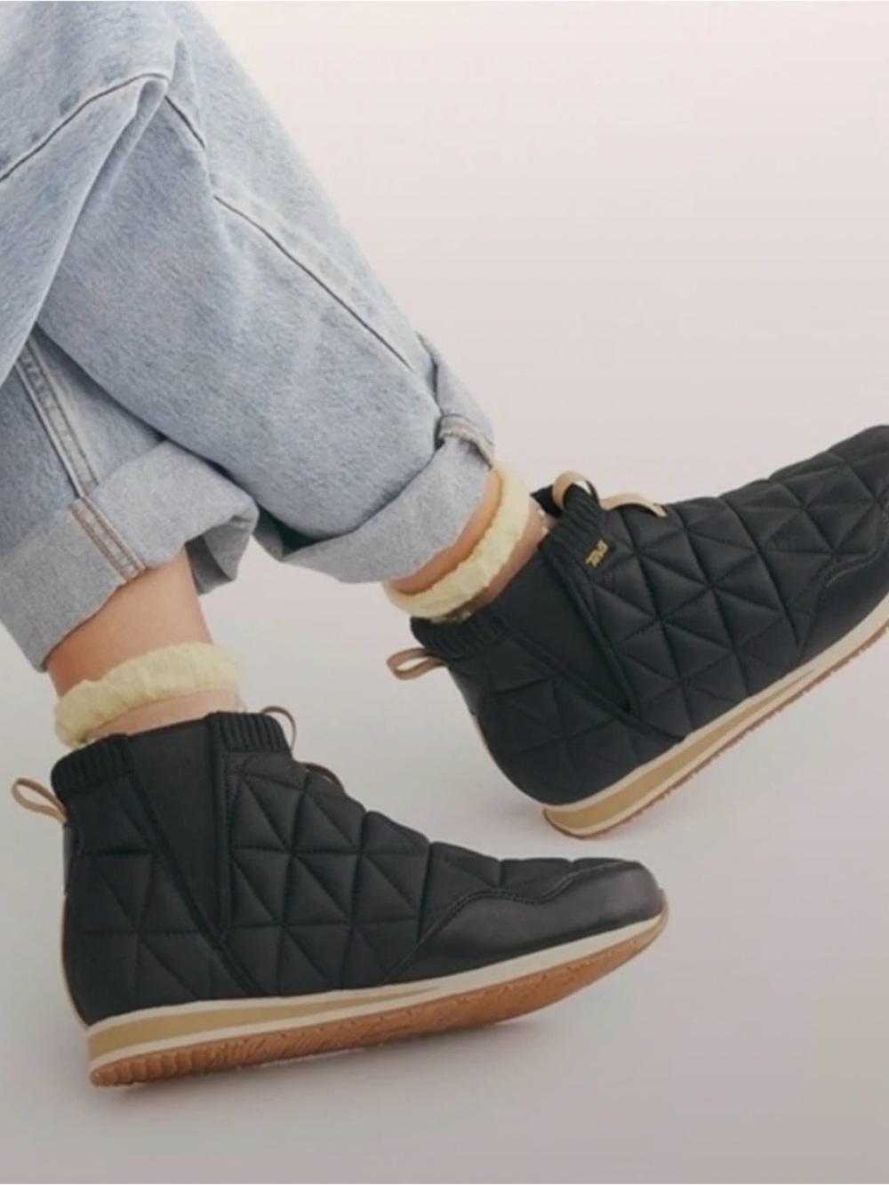 Teva Black Quilted Ankle Boots with Yellow Pull Tabs Size 7